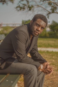 a man sitting on a bench